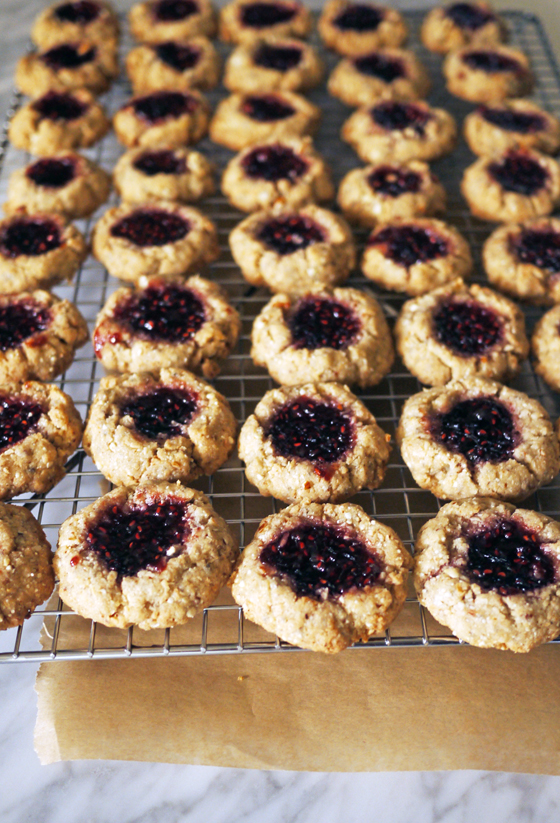 Coconut Almond Raspberry Thumbprint Cookies: The most delicious vegan cookie recipe. Even non-vegans will love this! | Stacie Billis