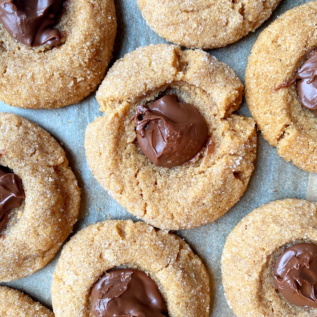 Peanut Butter Nutella Thumbprint Cookie recipe - naturally gluten-free and totally delicious | Stacie Billis